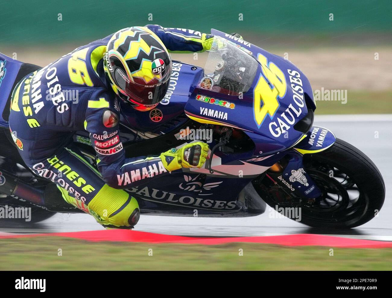 Italys Valentino Rossi takes on a Yamaha a turn on his way to win the MotoGP Chinese Grand Prix at Shanghai Sunday, May 1, 2005