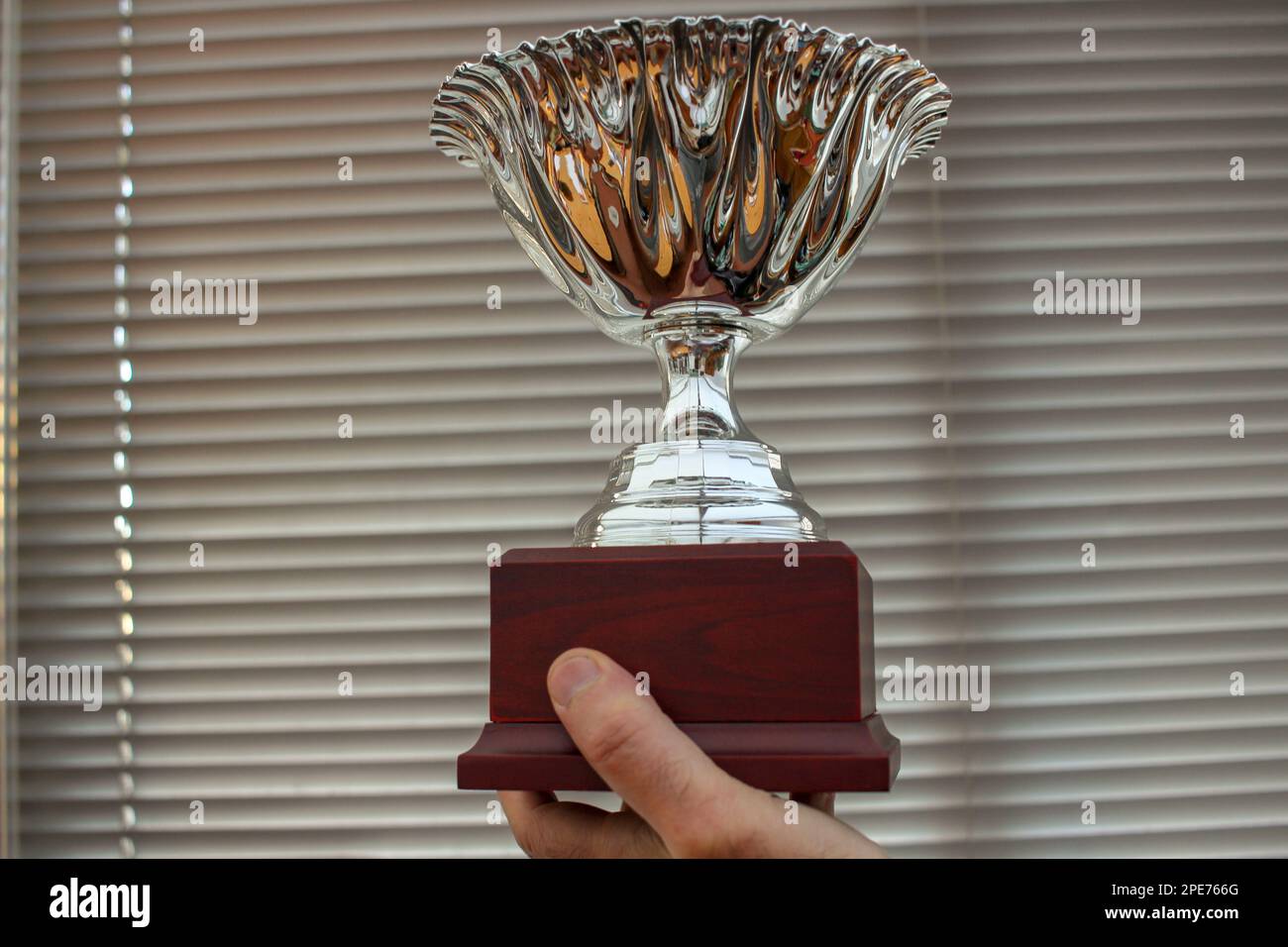 winning the trophy is possible if you do not give up Stock Photo