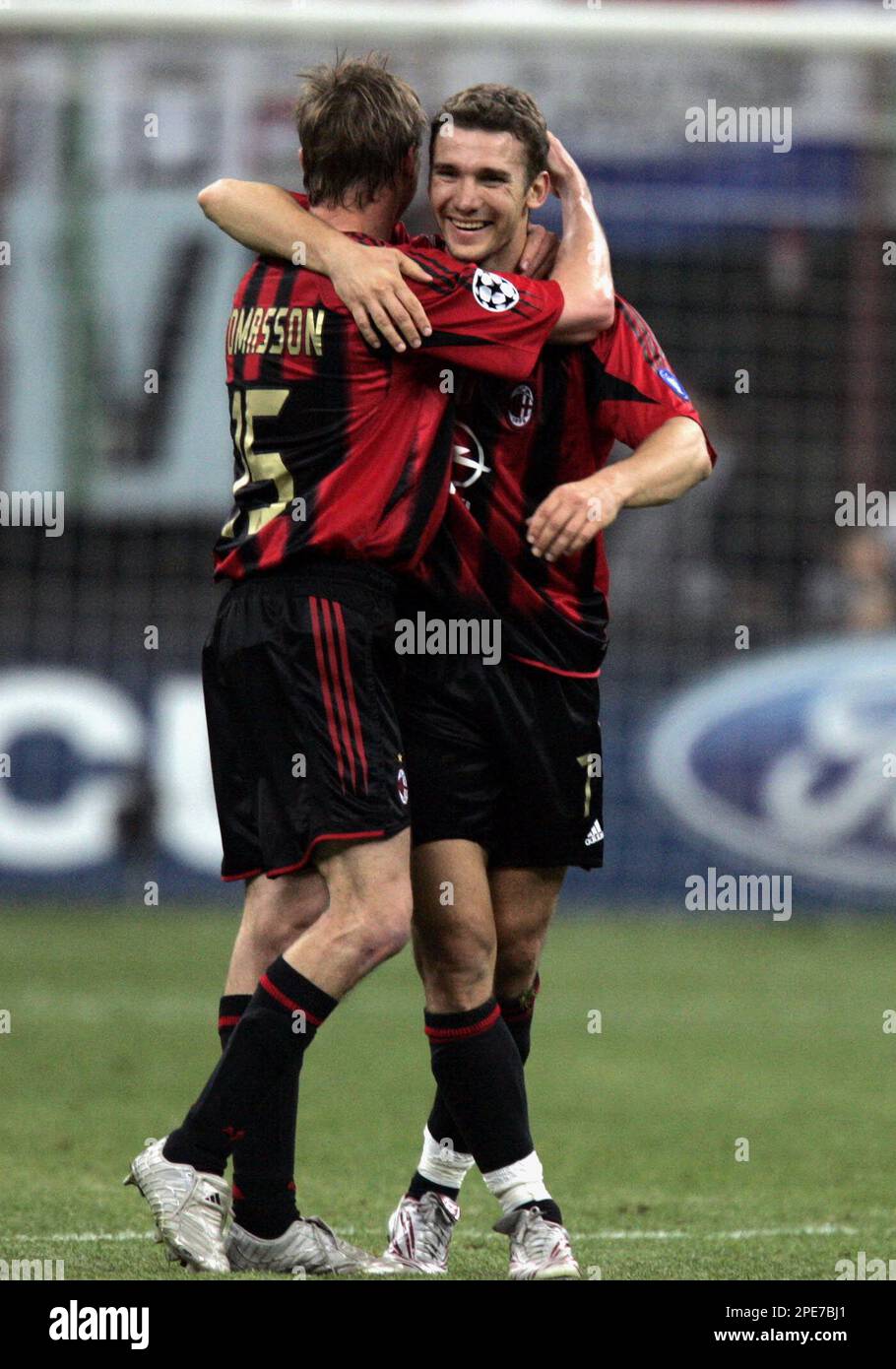 A.C. Milan's forward Jon Dahl Tomasson of Denmark, left, celebrates with  his teammate Andriy Shevchenko of Ukraine after scoring against PSV  Eindhoven during the Champions League semi-final first leg soccer match at