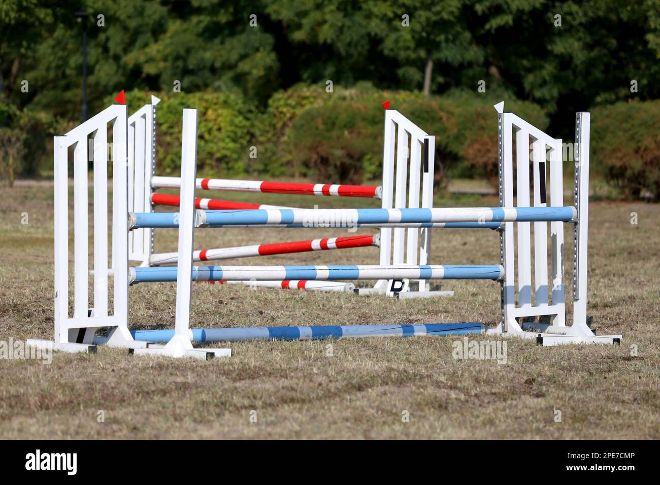 Show jumping poles obstacles, barriers, waiting for riders on show