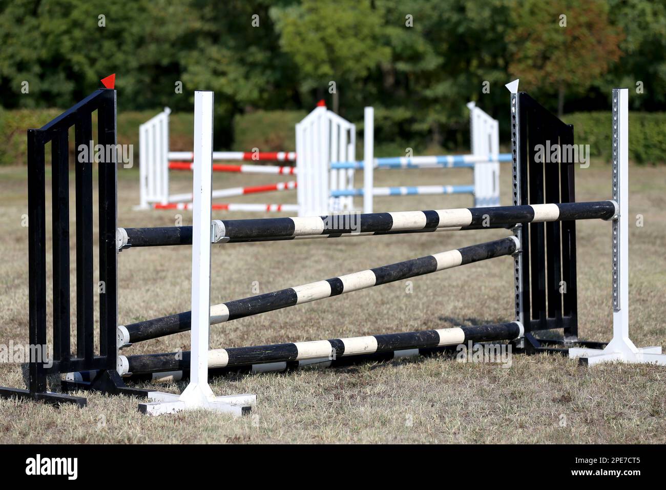 Show jumping poles obstacles, barriers, waiting for riders on show