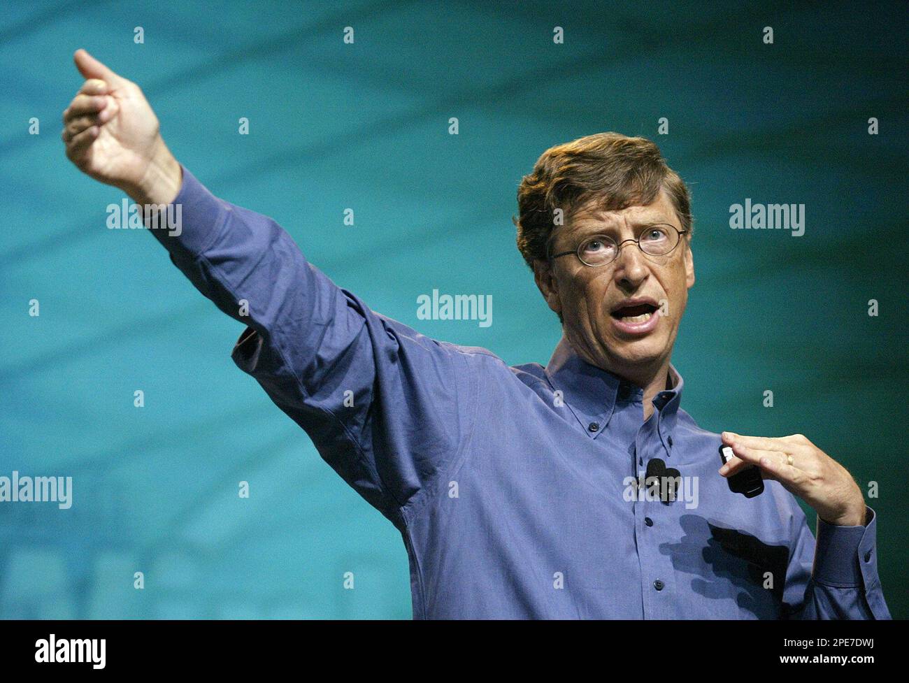 Microsoft Corp. Chairman Bill Gates gives the keynote address Monday, April 25, 2005 in Seattle at the 2005 Microsoft Windows Hardware Engineering Conference. Gates focused on the transition to 64-bit computing and the future of the company's next operating system, code-named "Longhorn." (AP Photo/Ted S. Warren) Stock Photo
