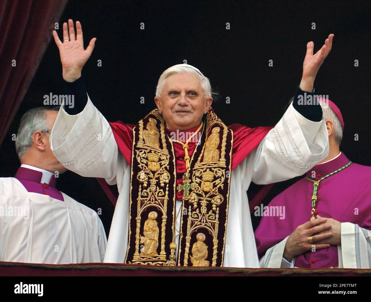 Vatican Master of Ceremonies Archbishop Piero Marini, right, speaks to ...