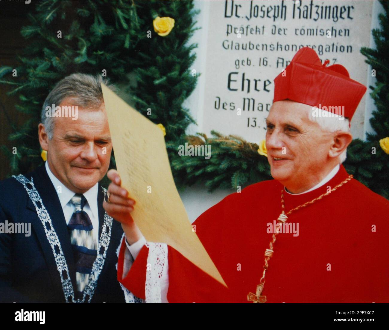 ** FILE ** German Cardinal Joseph Ratzinger, right, holds an ...