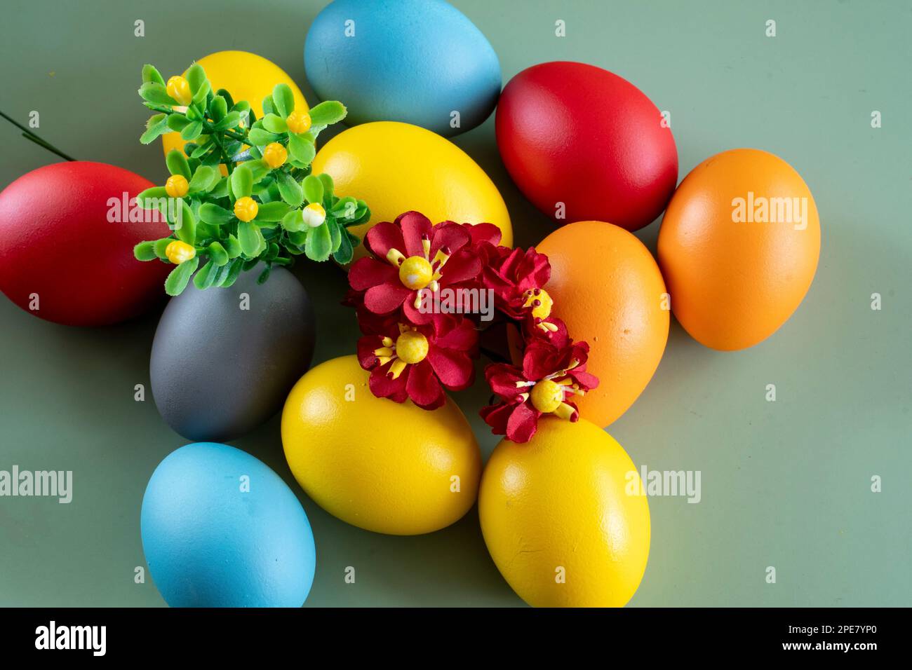 colorful eggs symbolize easter. Easter minimal concept. Creative Happy Easter, spring layout. Stock Photo