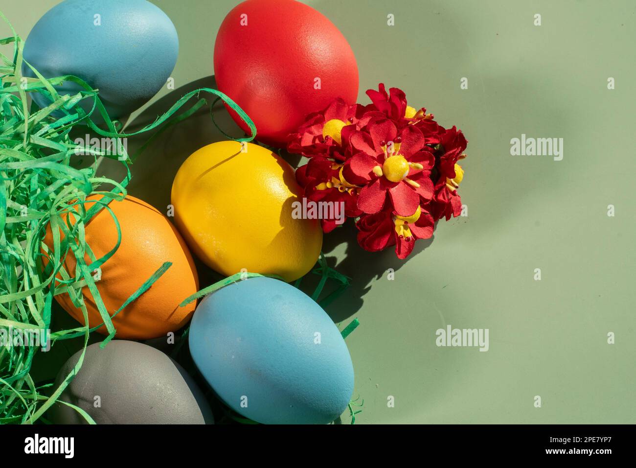 colorful eggs symbolize easter. Easter minimal concept. Creative Happy Easter, spring layout. Stock Photo