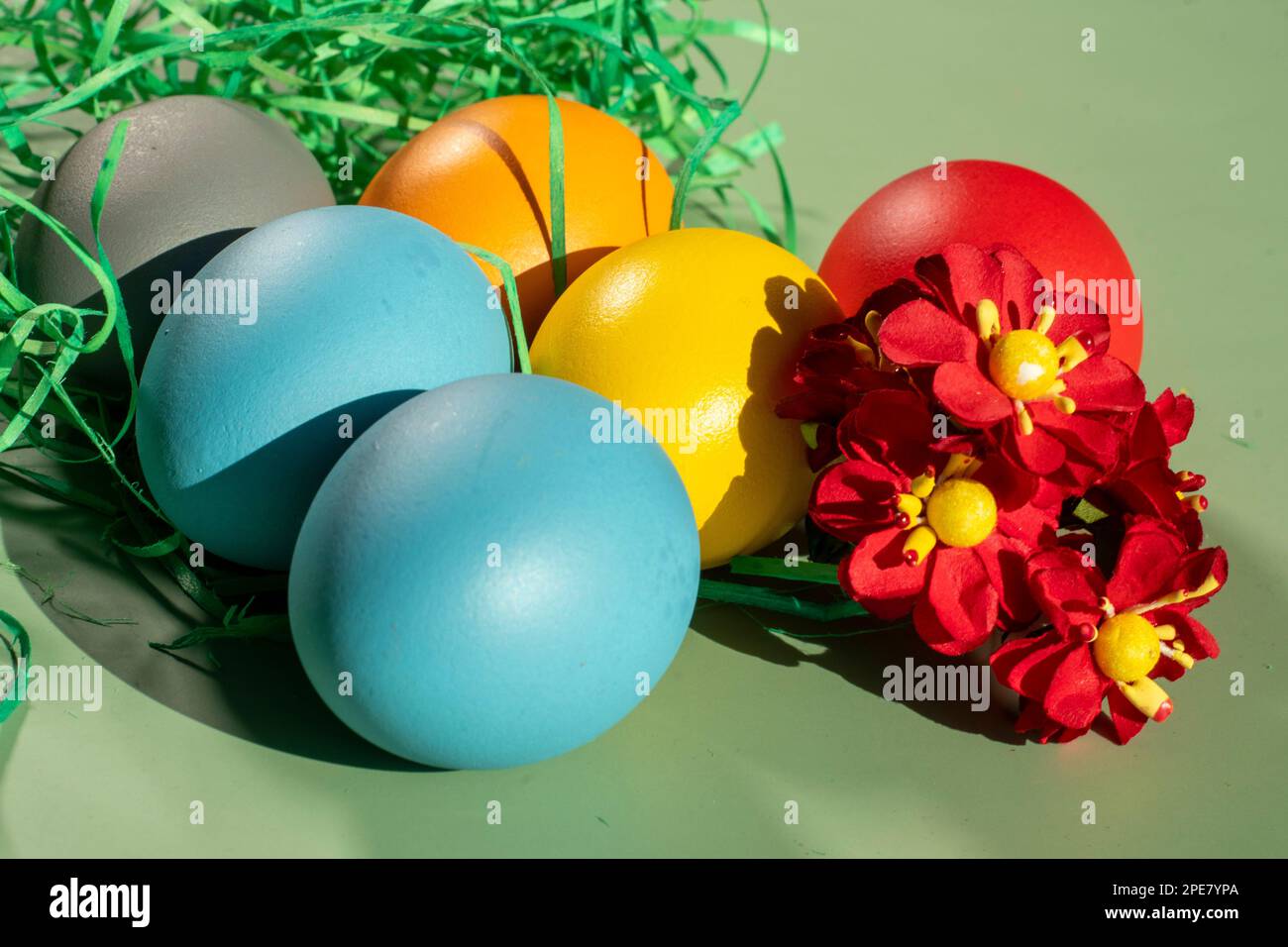 colorful eggs symbolize easter. Easter minimal concept. Creative Happy Easter, spring layout. Stock Photo