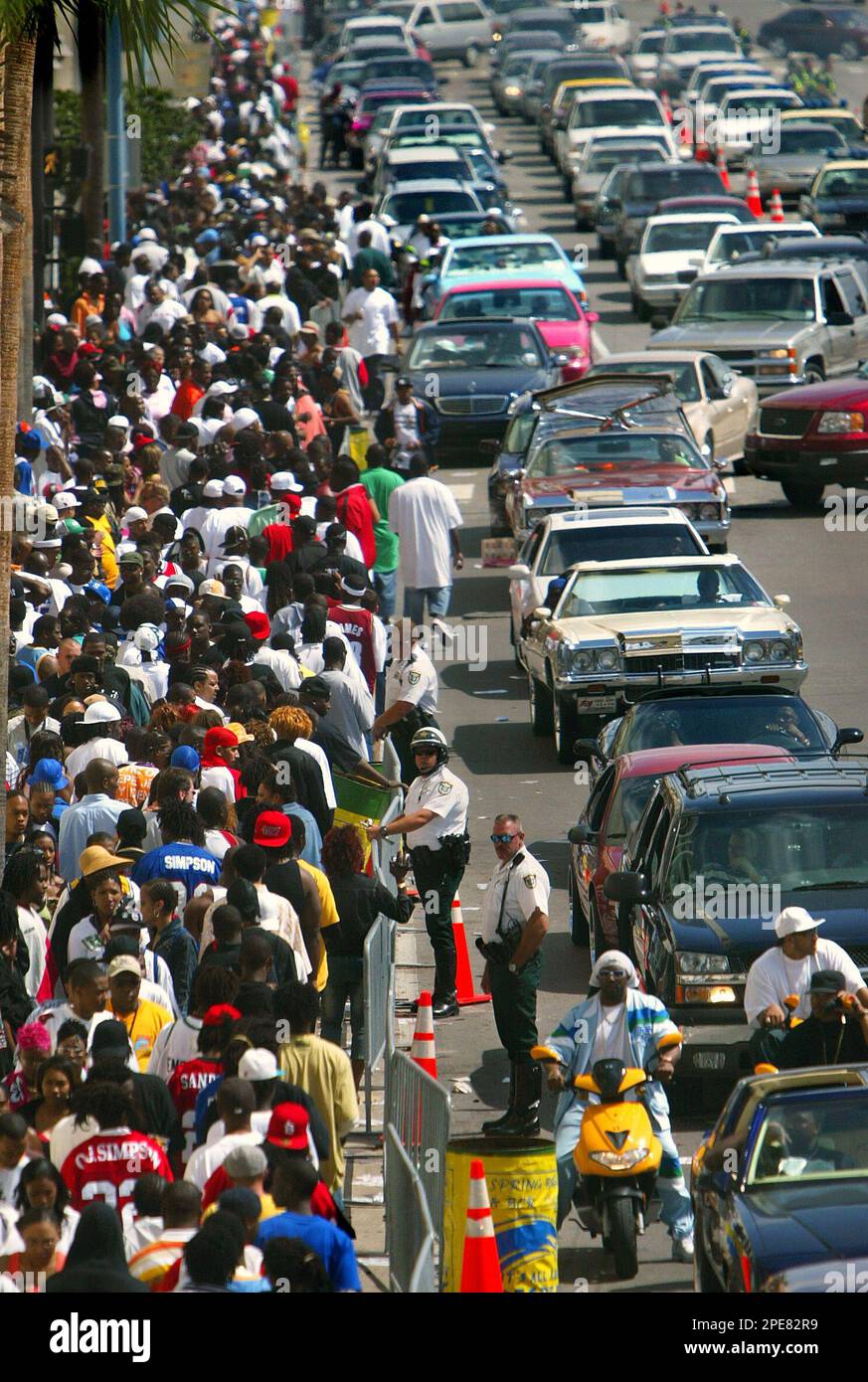 Crowds jam the streets along Highway A1A near the Adam's Mark Hotel