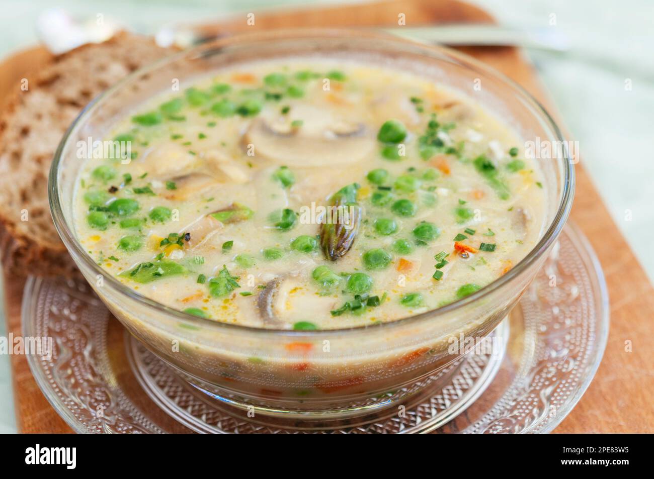 Creamy Mushroom Soup with Spring Vegetables Stock Photo