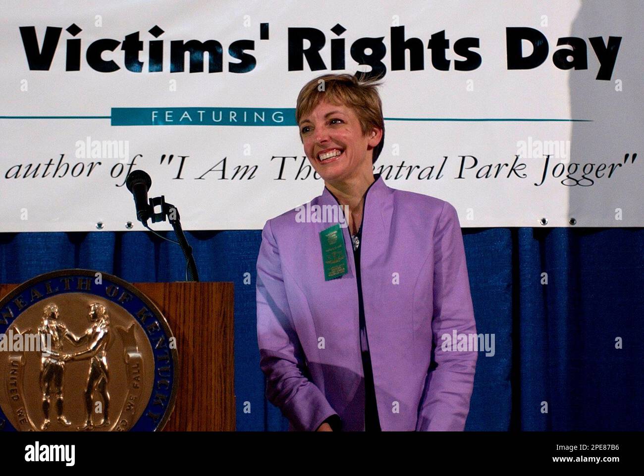 Trisha Meili, author of "I Am The Central Park Jogger" acknowledges the  applause of people gathered in the Capitol Rotunda Thursday, April 14,  2005, in Frankfort, Ky., after delivering a speech at