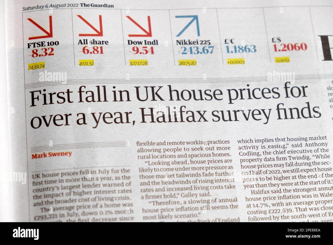 'First fall in UK house prices for over a year, Halifax survey finds' Guardian newspaper headline financial housing market article 6 August 2022 UK Stock Photo