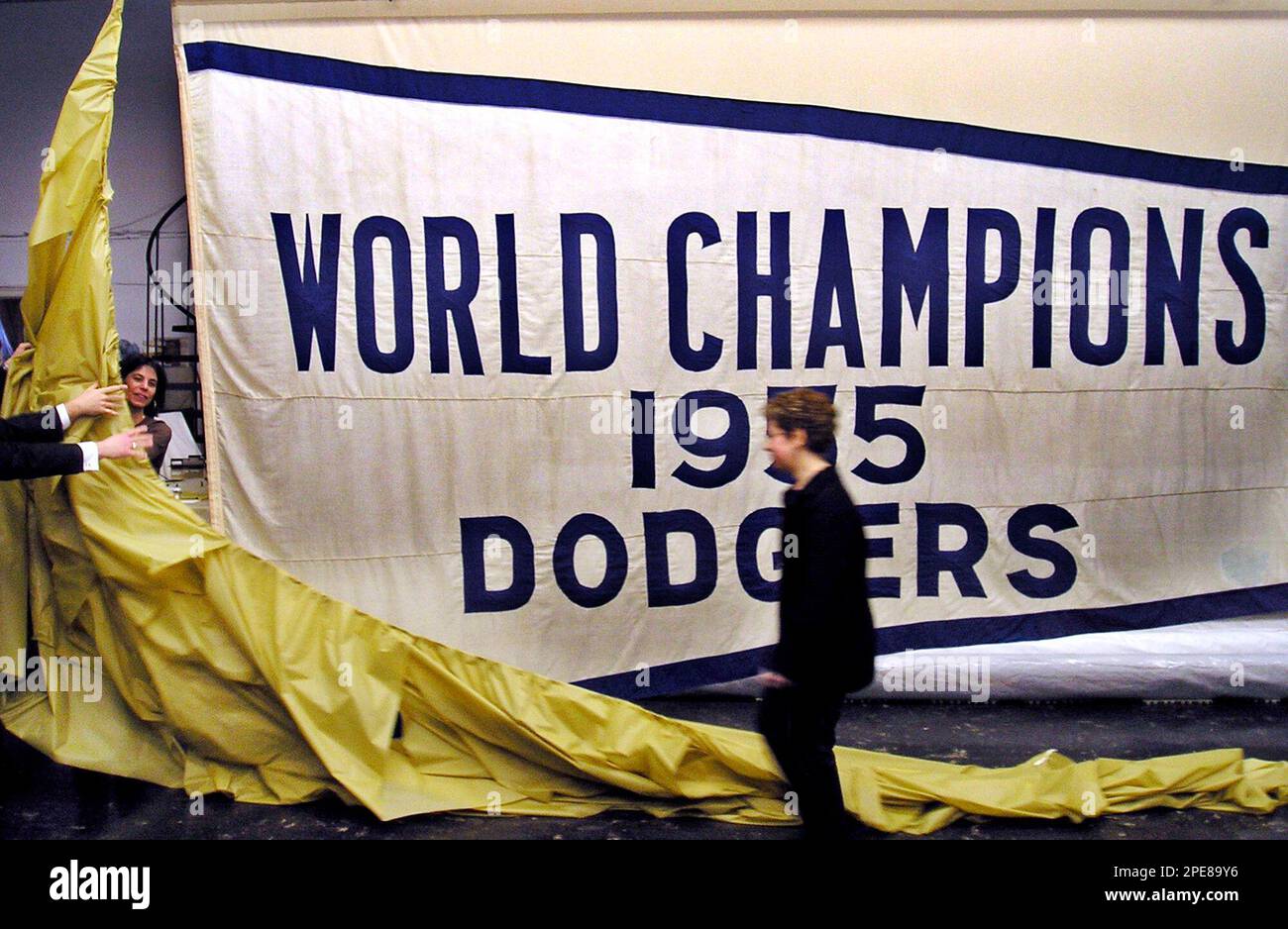 The 1955 World Series championship banner which the Brooklyn Dodgers  captured by defeating the New York Yankees, is unveiled in New York,  Wednesday, April 13, 2004 after a $16,000 restoration by textile