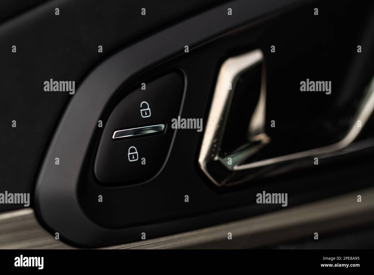 Car central door lock and unlock button close up. Close and open signs ...
