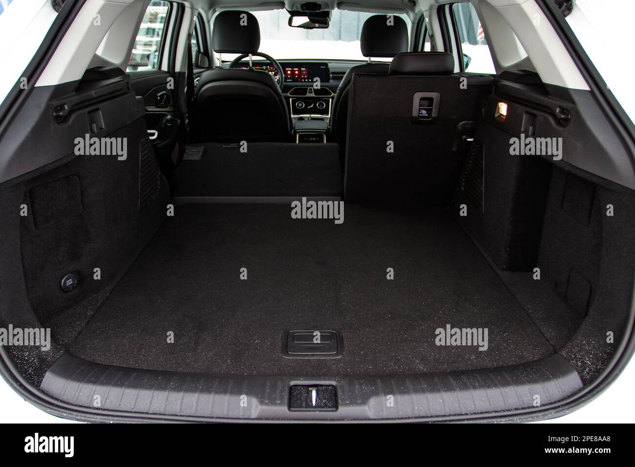 Huge, clean and empty car trunk in interior of compact suv. Rear view