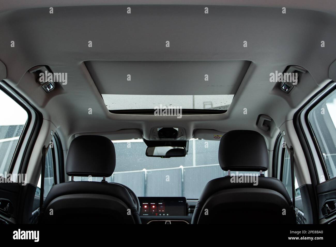 Panoramic glass sun roof in the car Stock Photo Alamy