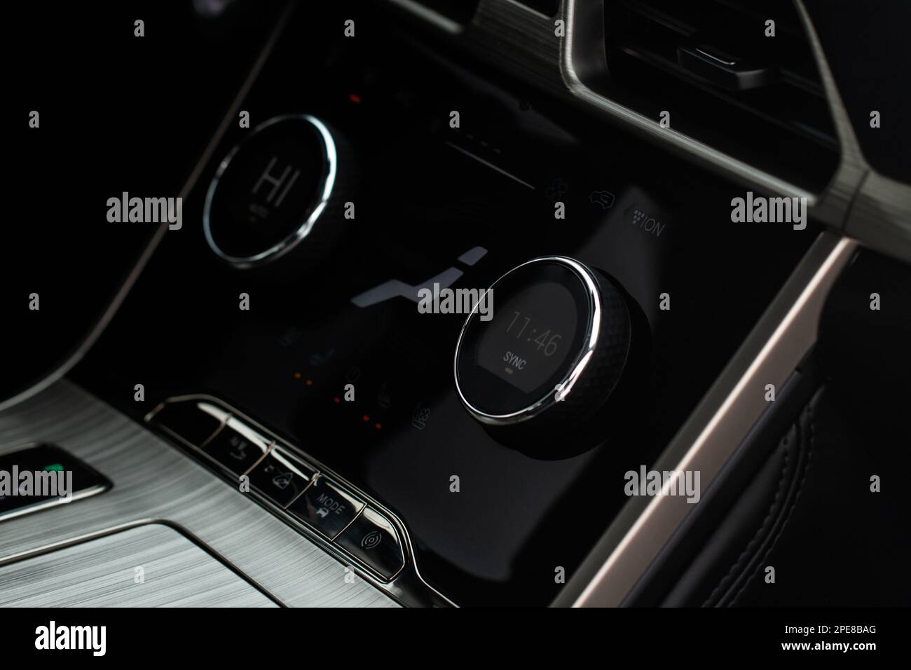 Modern car passenger’s temperature control. Car air conditioning system button. Automatic