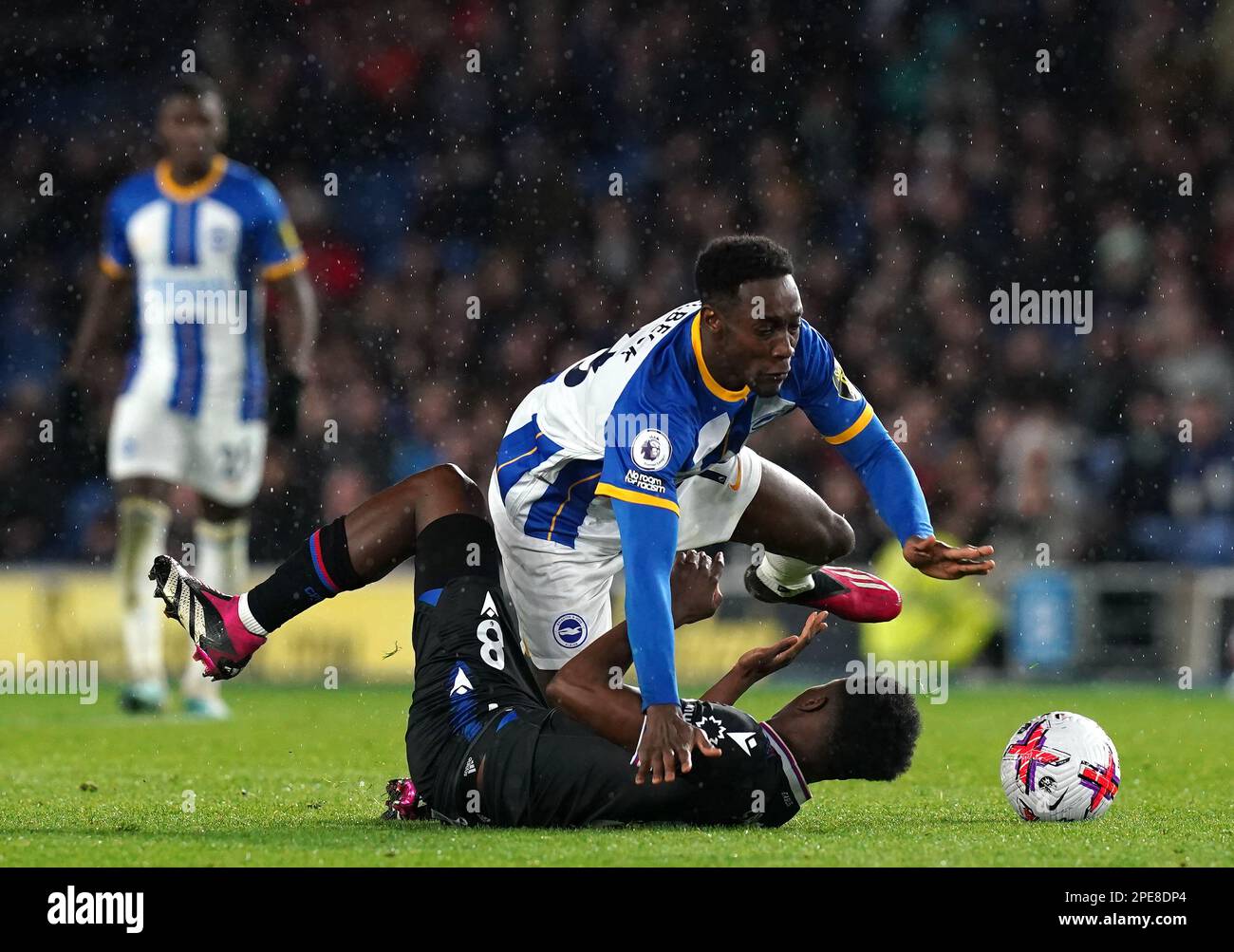Brighton and Hove Albion's Danny Welbeck collides with Crystal Palace's