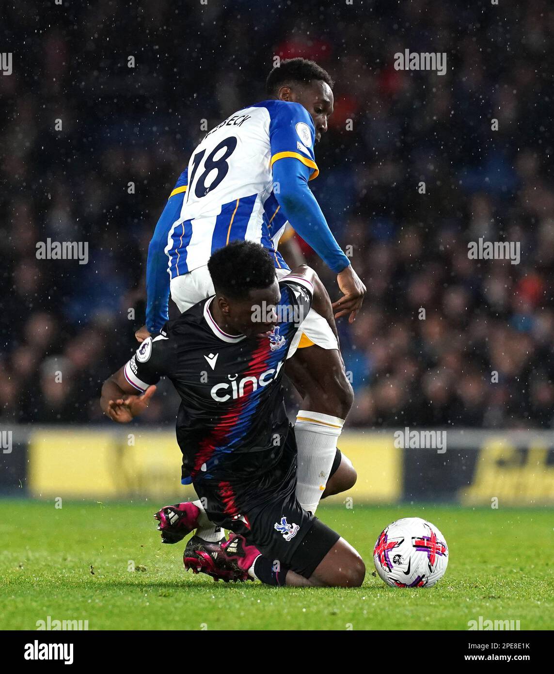 Brighton and Hove Albion's Danny Welbeck collides with Crystal Palace's