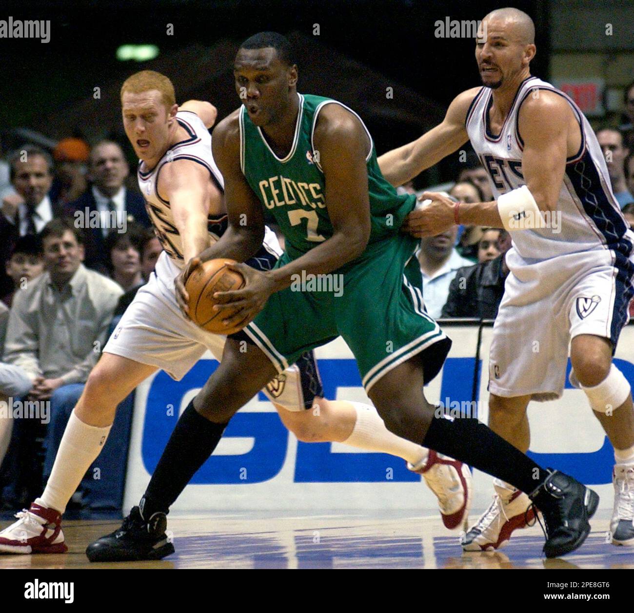 Boston Celtics' Al Jefferson (7) is pressured by New Jersey Nets' Brian  Scalabrine, left, and Jason Kidd during the first quarter Saturday, April  9, 2005 in East Rutherford, N.J. The Nets won