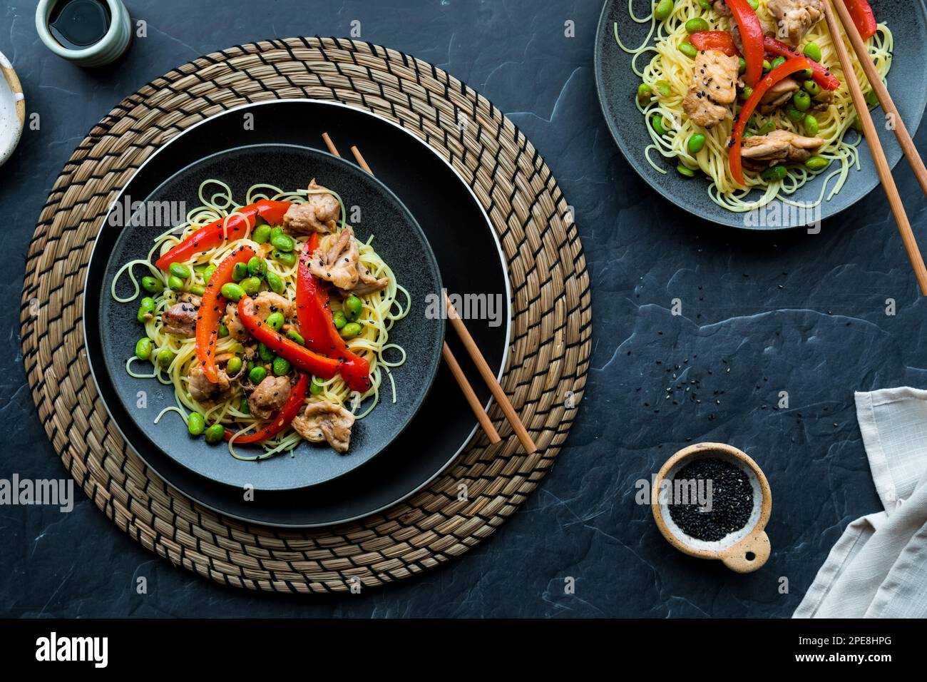 a delicious chicken edamame dish garnished with black sesame seeds