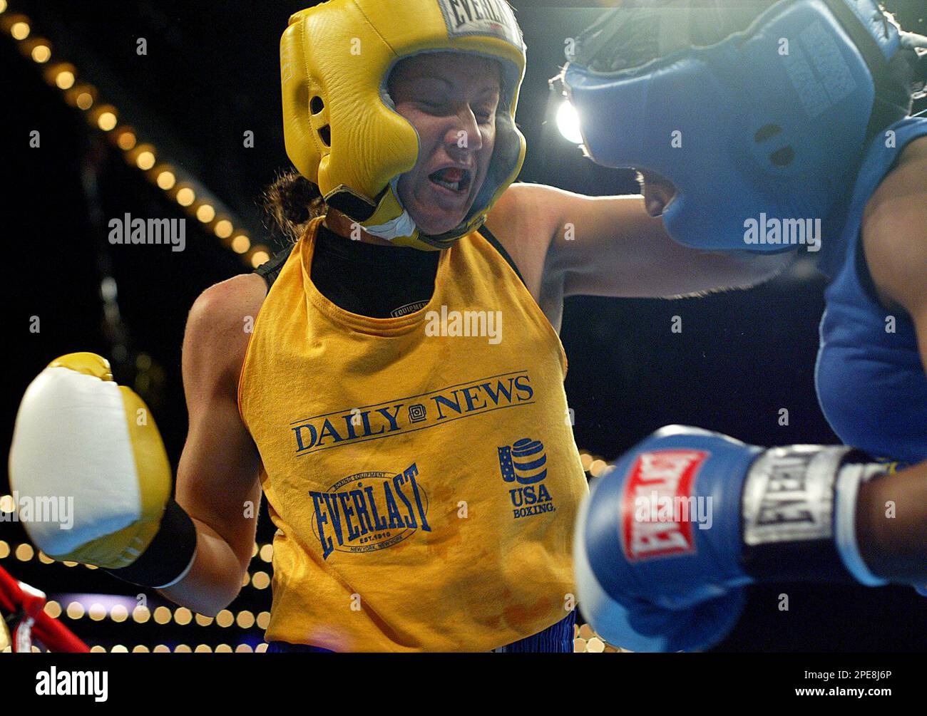 Maureen Shea, left, fights Ronica Jeffrey during a Golden Gloves tournament Friday, April 8, 2005, in New York