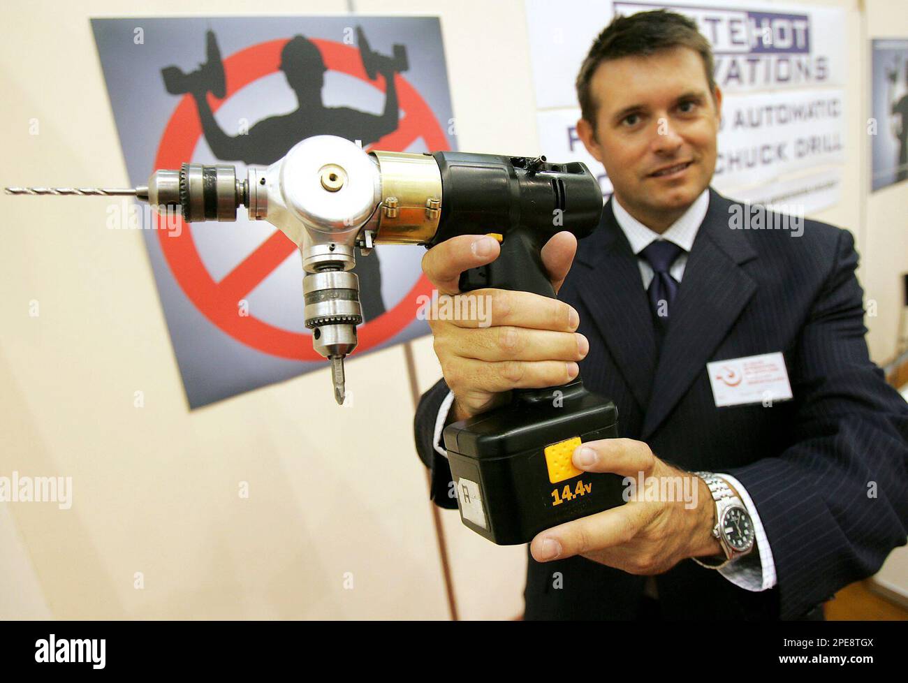 Stuart Rees of Australia presents his invention, the double chuck drill at the 33st