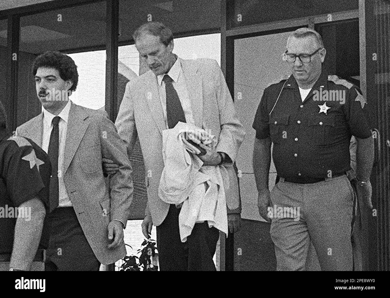 ** ADVANCE FOR SUNDAY, APRIL 17 **FILE**Faith Assembly leader Hobart Freeman, center, leaves the