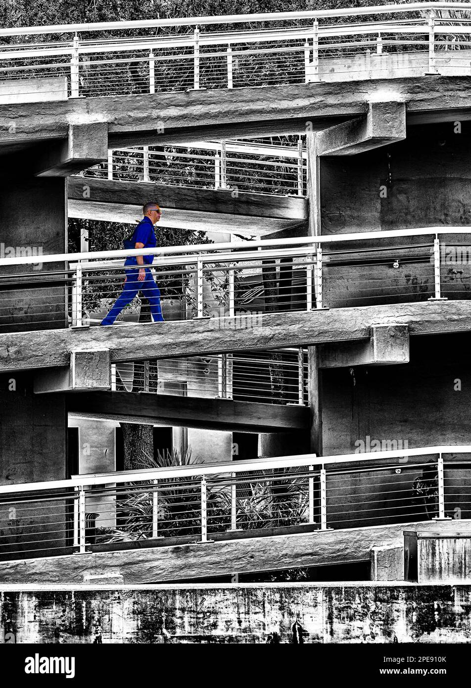 Pedestrian on the Zigzagging ADA access Ramp to the Andrews Avenue Bascule Bridge in the Riverwalk area of downtown Fort Lauderdale Stock Photo