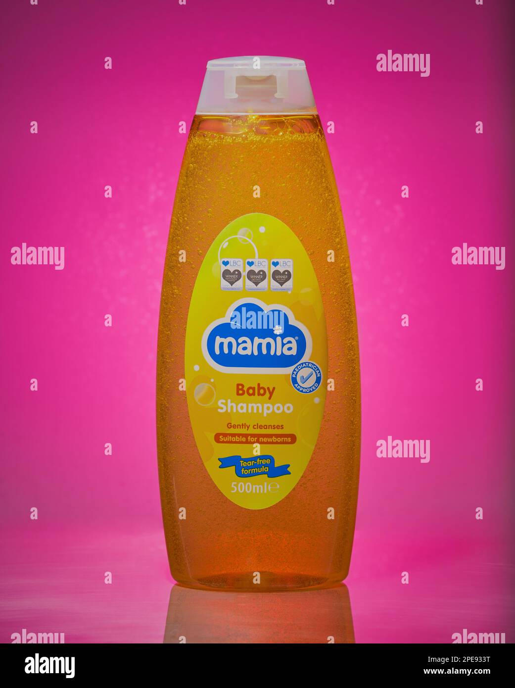 Bottle of baby shampoo on a cool pink background Stock Photo Alamy