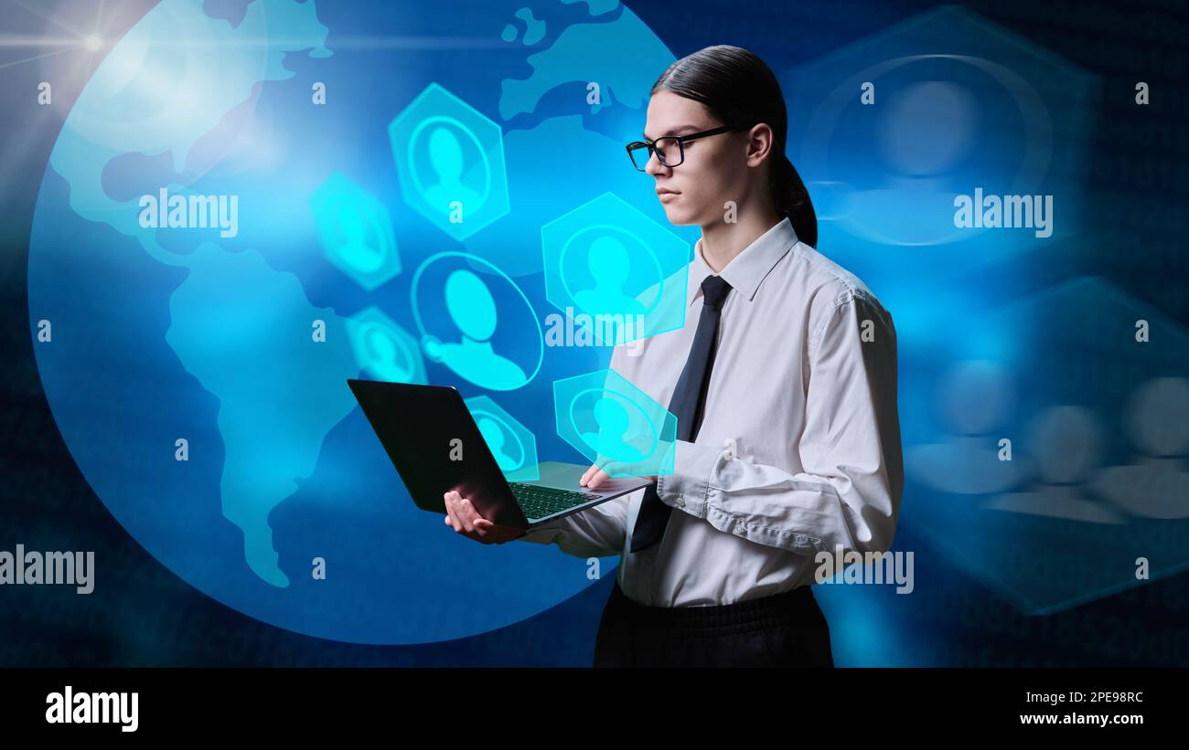 Student guy using laptop for global online communication Stock Photo