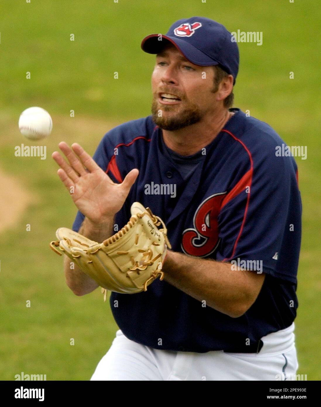 Cleveland Indians pitcher Paul Shuey catches a ball hit by Detroit