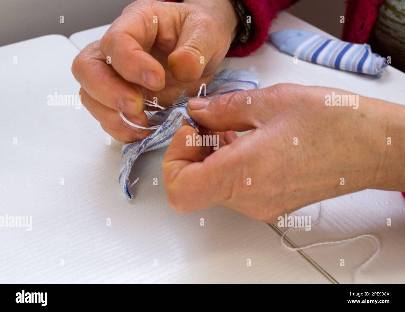 learn to sew Stock Photo Alamy