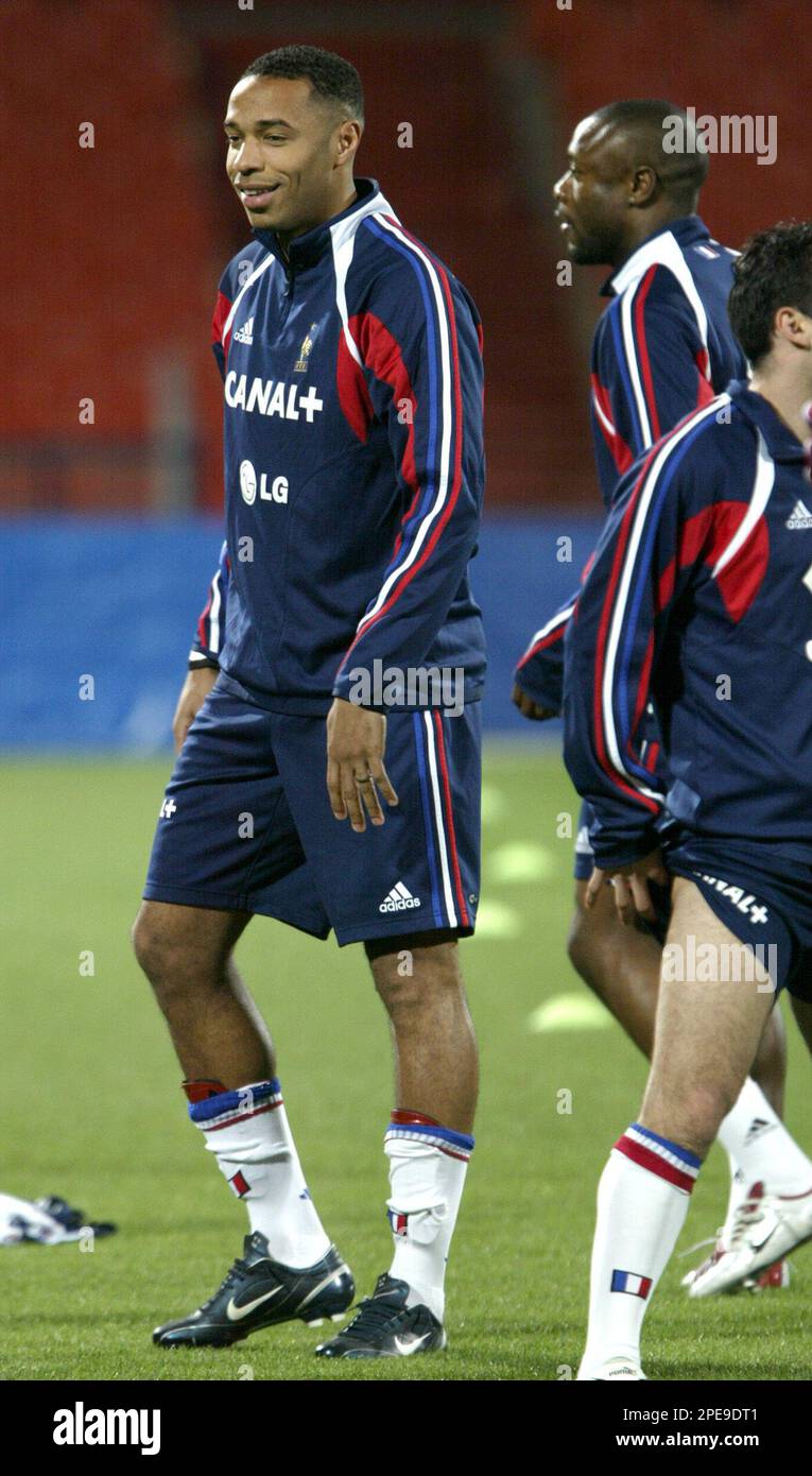 Forward Thierry Henry of France's national soccer team smiles during  training at Ramat Gan stadium Tel Aviv, Israel, Tuesday March 29, 2005.  France is scheduled to play the World Cup Group 4