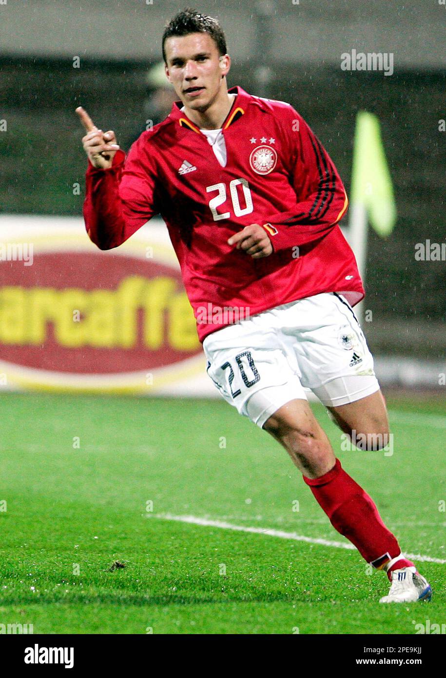 German forward Lukas Podolski celebrates after scoring a goal during a  friendly soccer match between Germany and Slovenia in the " Petrol Arena "  in Celje, Slovenia, on Saturday, March 26, 2005. (