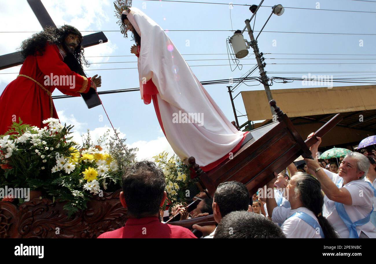 Belivers from Orosi, about 35 km South of San Jose, carry a statue of ...