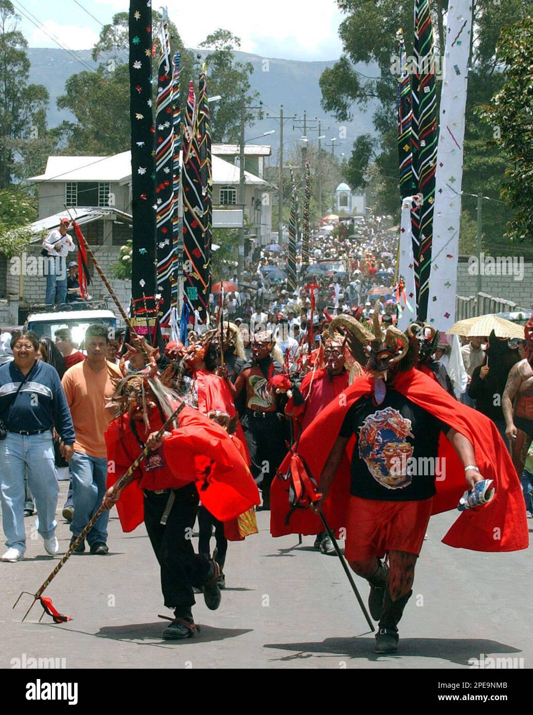 Devils lead the Good Friday procession during Holy Week celebrations in