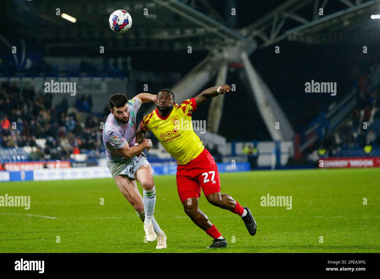 Huddersfield, UK. 15th Mar, 2023. Tyreece Simpson #27 of Huddersfield Town and Grant Hanley #5 of Norwich City during the Sky Bet Championship match Huddersfield Town vs Norwich City at John Smith's Stadium, Huddersfield, United Kingdom, 15th March 2023 (Photo by Ben Early/News Images) Credit: News Images LTD/Alamy Live News Stock Photo