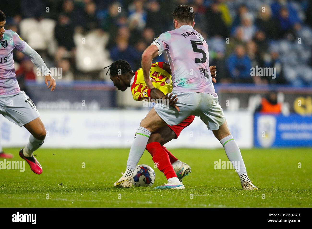 Huddersfield, UK. 15th Mar, 2023. Brahima Diarra #35 of Huddersfield Town and Grant Hanley #5 of Norwich City during the Sky Bet Championship match Huddersfield Town vs Norwich City at John Smith's Stadium, Huddersfield, United Kingdom, 15th March 2023 (Photo by Ben Early/News Images) Credit: News Images LTD/Alamy Live News Stock Photo