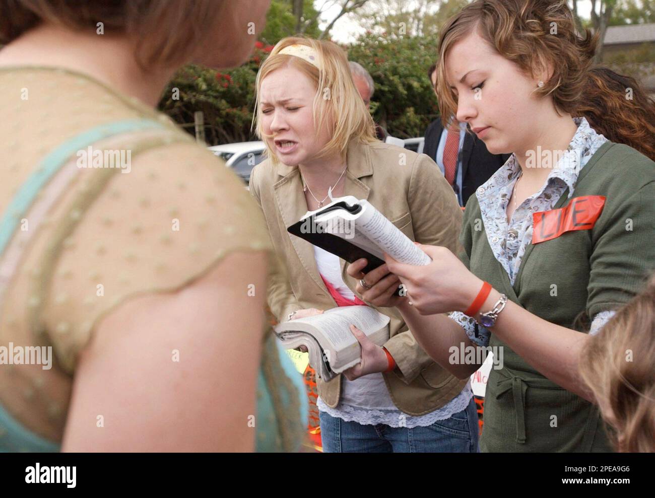 Robin Shannon, 23, left, and Rebekah Richardson, 17, and other