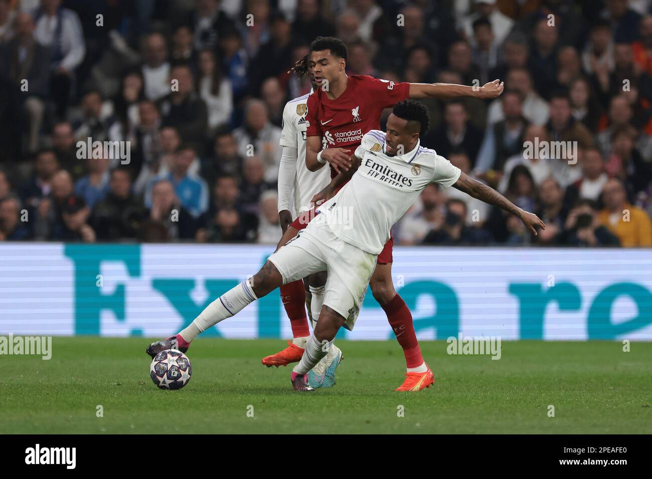 Madrid, Spain. 15th Mar, 2023. Cody Gakpo of Liverpool FC tussles with Eder Militao of Real Madrid during the UEFA Champions League match at the Santiago Bernabeu, Madrid. Picture credit should read: Jonathan Moscrop/Sportimage Credit: Sportimage/Alamy Live News Stock Photo