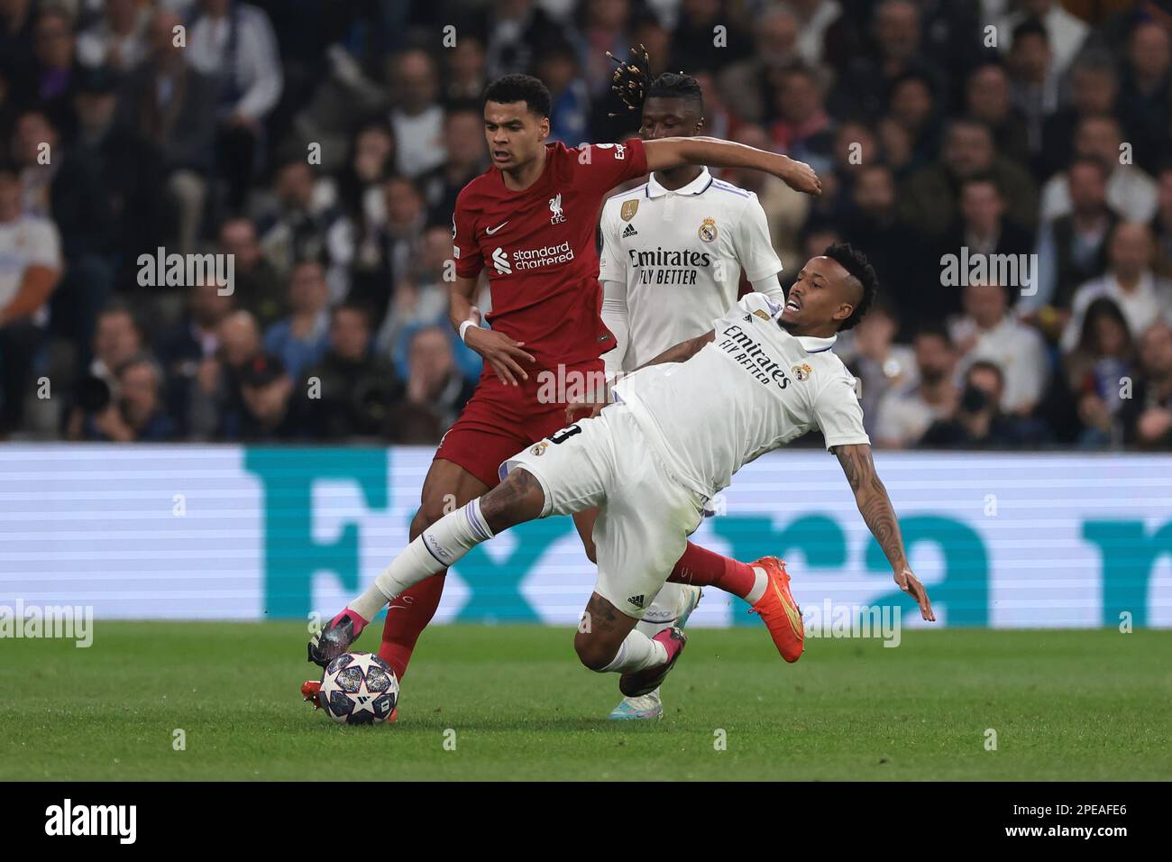 Madrid, Spain. 15th Mar, 2023. Cody Gakpo of Liverpool FC tussles with Eder Militao of Real Madrid during the UEFA Champions League match at the Santiago Bernabeu, Madrid. Picture credit should read: Jonathan Moscrop/Sportimage Credit: Sportimage/Alamy Live News Stock Photo