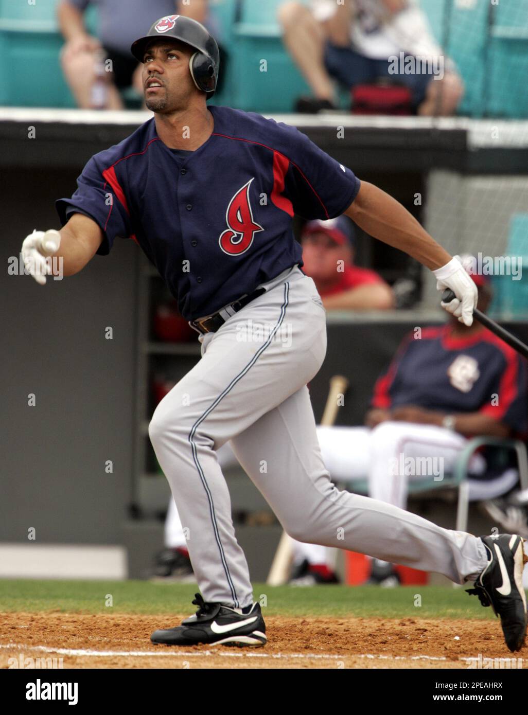 Cleveland Indians outfielder Juan Gonzalez watches his double go down the  line against the Washington Natonals during a spring training game on  Tuesday, March 15, 2005 in Viera, Fla. After spending much