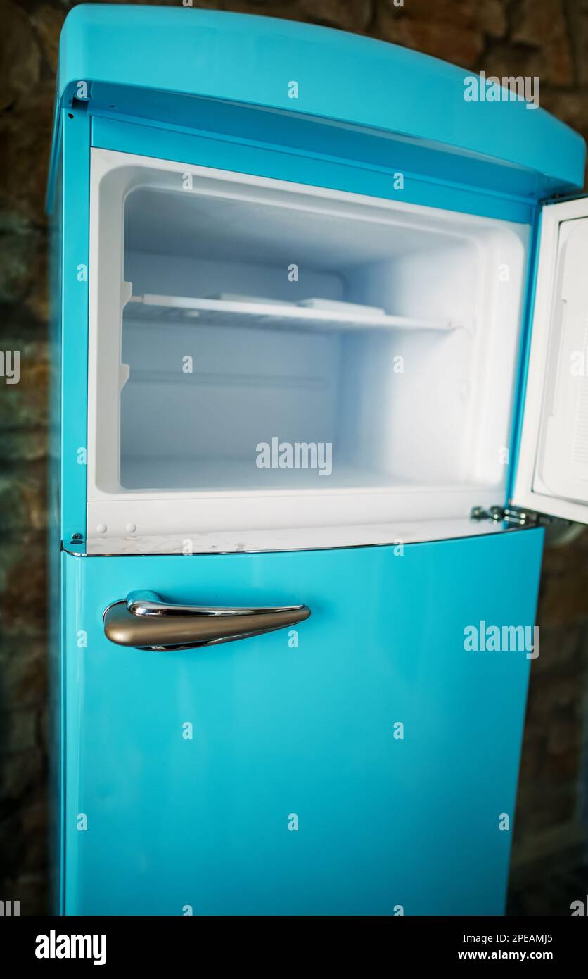 Retro refrigerator freezer with opened door Stock Photo Alamy