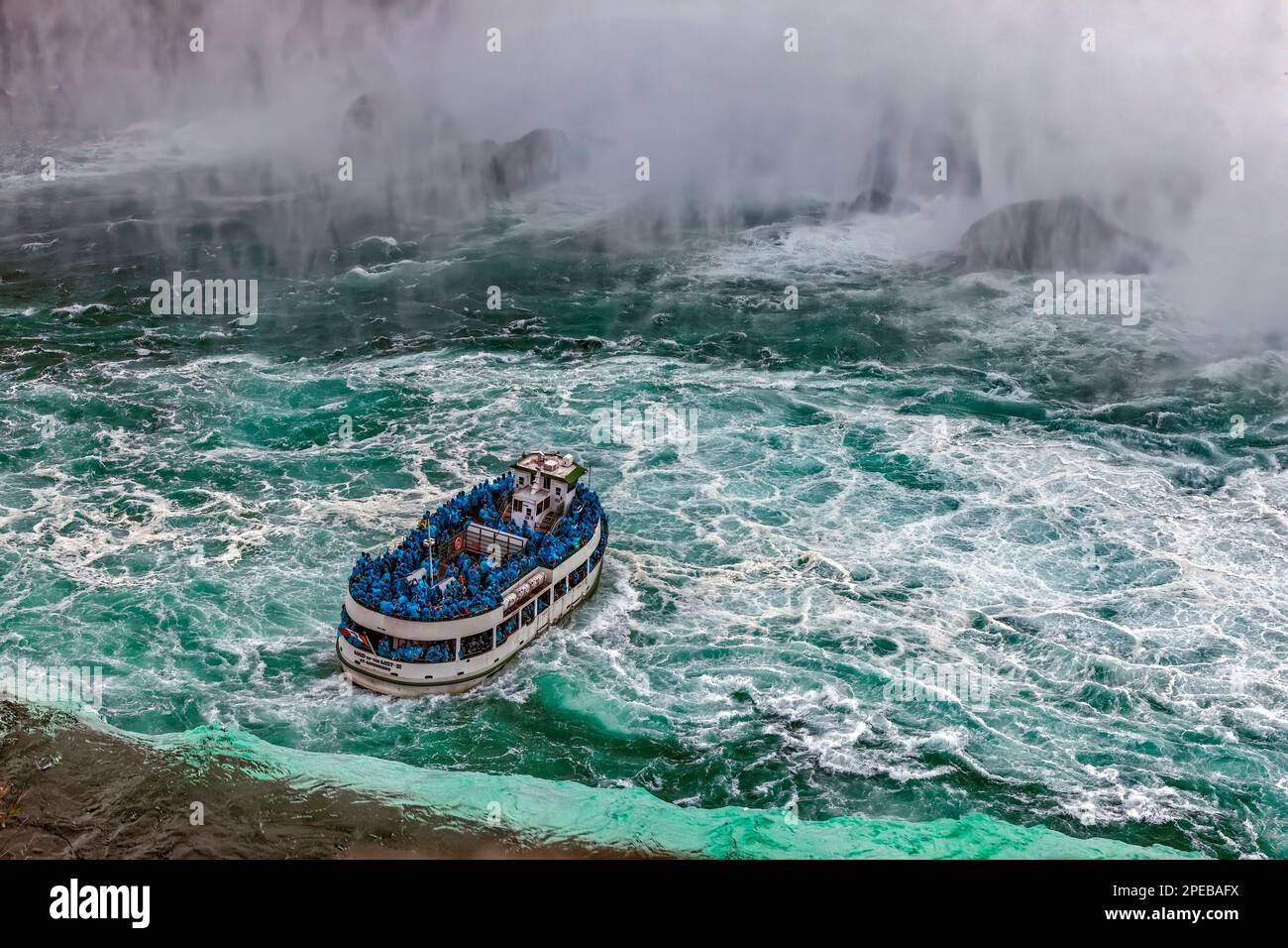 Maid of the Mist VI taking Visitors into Niagra Falls. Niagara Falls is