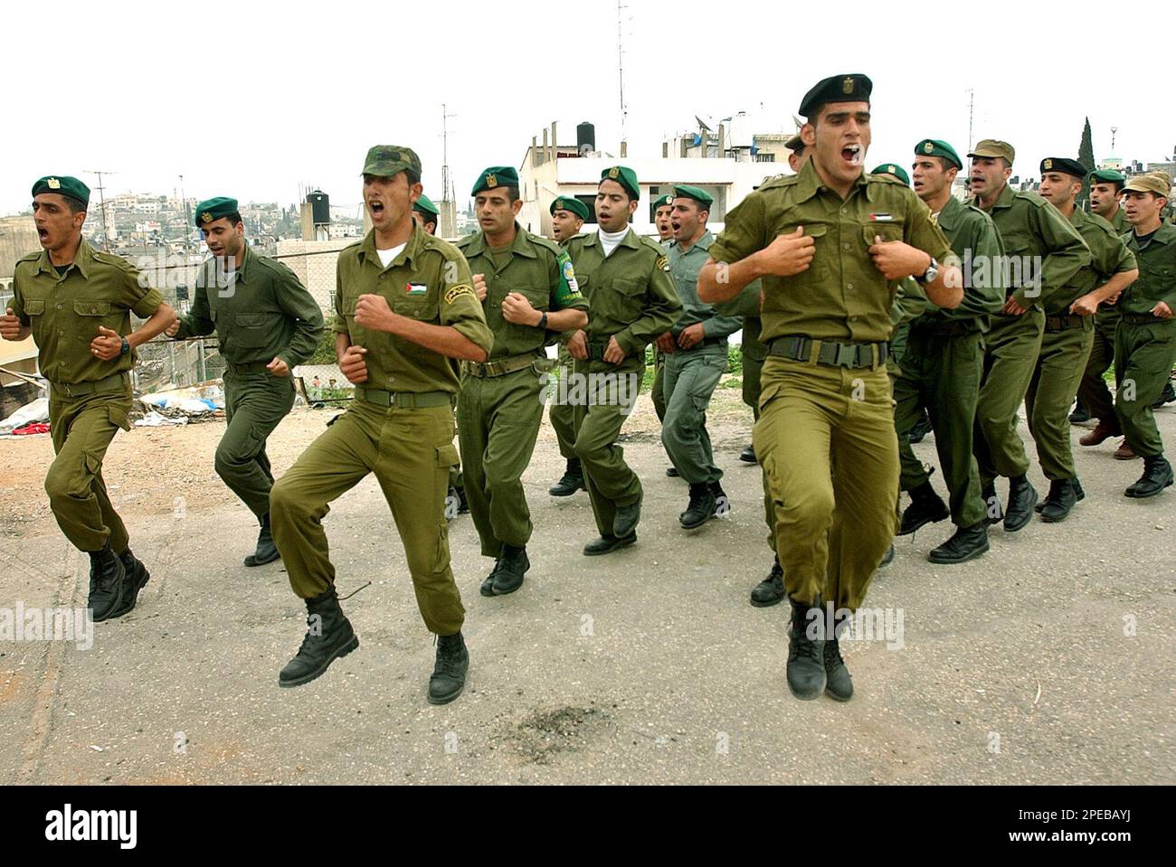Palestinian police officers march during a training session in the 