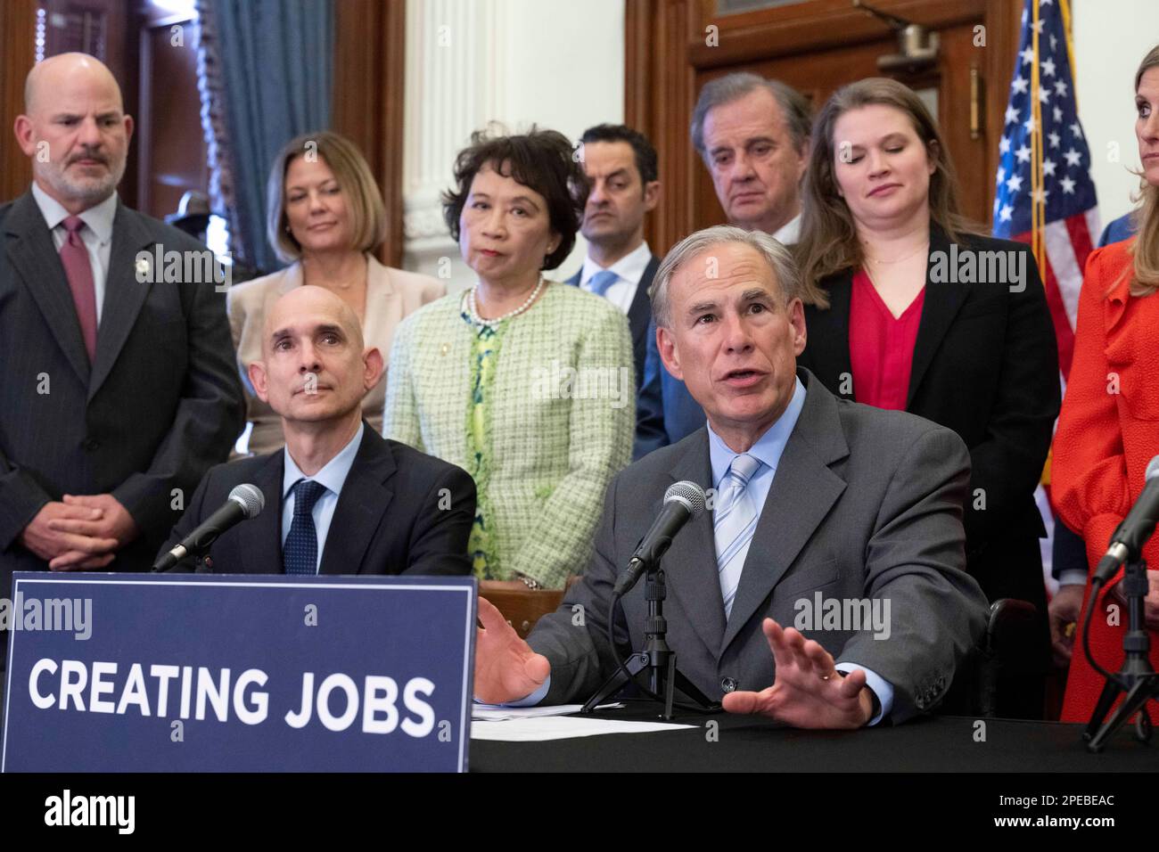 Texas, USA. 15th Mar, 2023. Texas Governor GREG ABBOTT, r, along with Texas elected officials, educators and business representatives, holds a press conference supporting the Texas CHIPS Act. The Creating Helpful Incentives to Produce Semiconductors (CHIPS) Act, if passed, would focus on Texas research and development efforts in winning semiconductor chip projects. Credit: Bob Daemmrich/Alamy Live News Credit: Bob Daemmrich/Alamy Live News Stock Photo