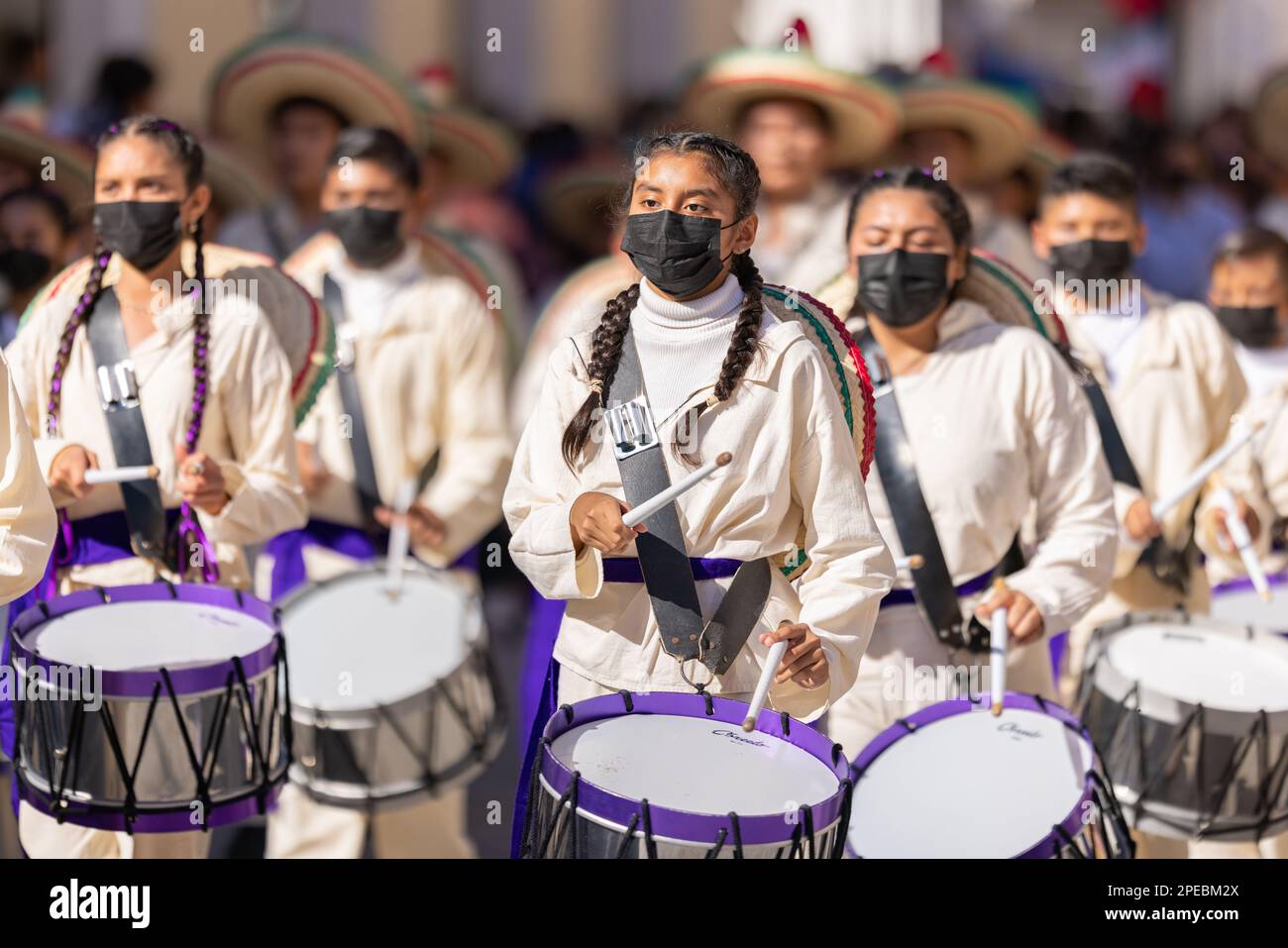 Matamoros, Tamaulipas, Mexico - November 26, 2022: The Desfile del 20 de Noviembre, Members of the Escuela Secundaria General No 7 marching band, wear Stock Photo