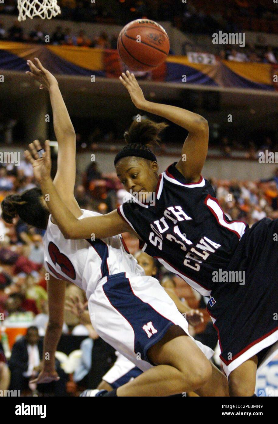 South Carolina's Stacy Booker (31) crashes into Mississippi's Amber