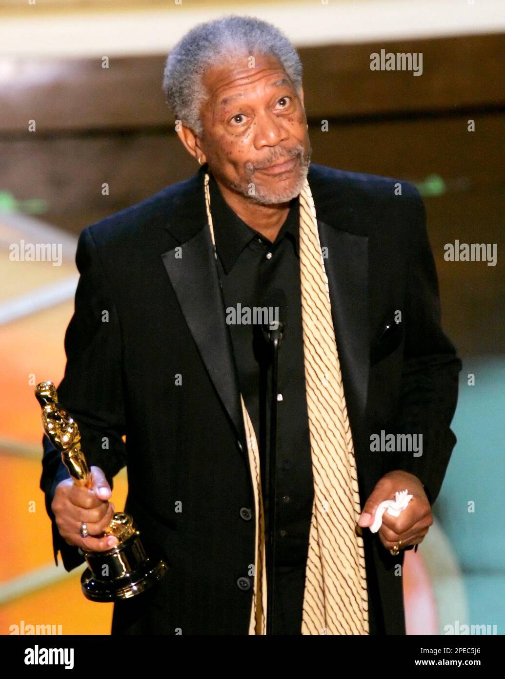 Actor Morgan Freeman accepts the Oscar for best supporting actor for