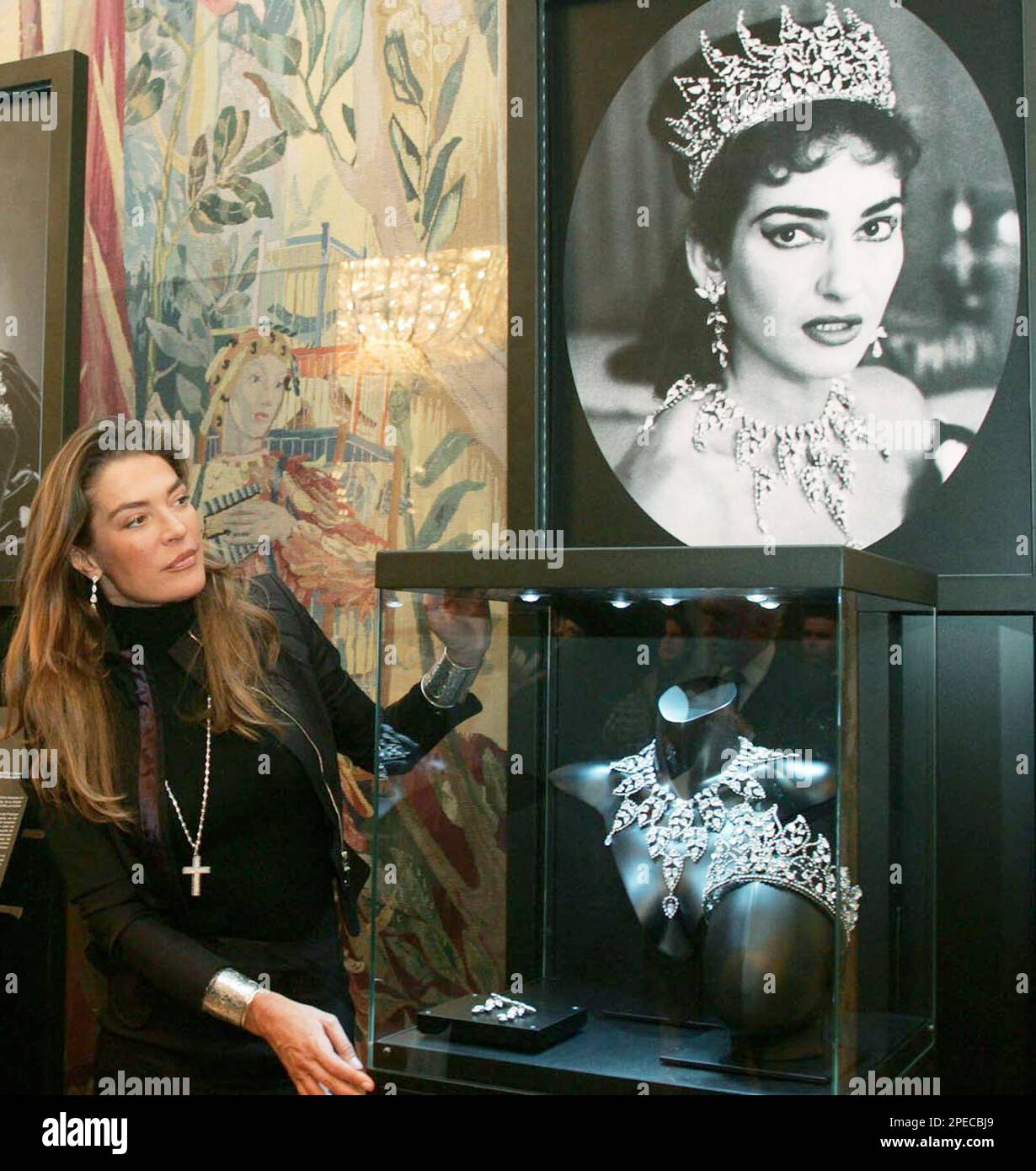 FILE ** Fiona Winter-Swarovski presents a necklace which was designed for  famed soprano Maria Callas, in portrait above, for a 1956 performance of  the opera "Tosca" at the New York Metropolian